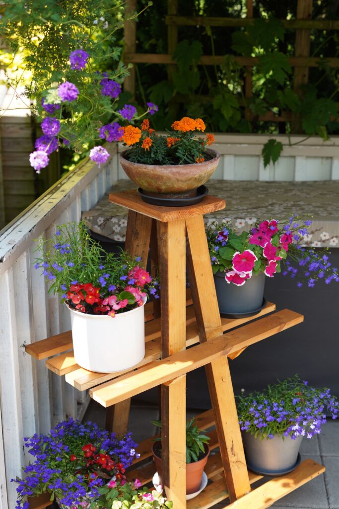 flower plant stand with tiers in apartment